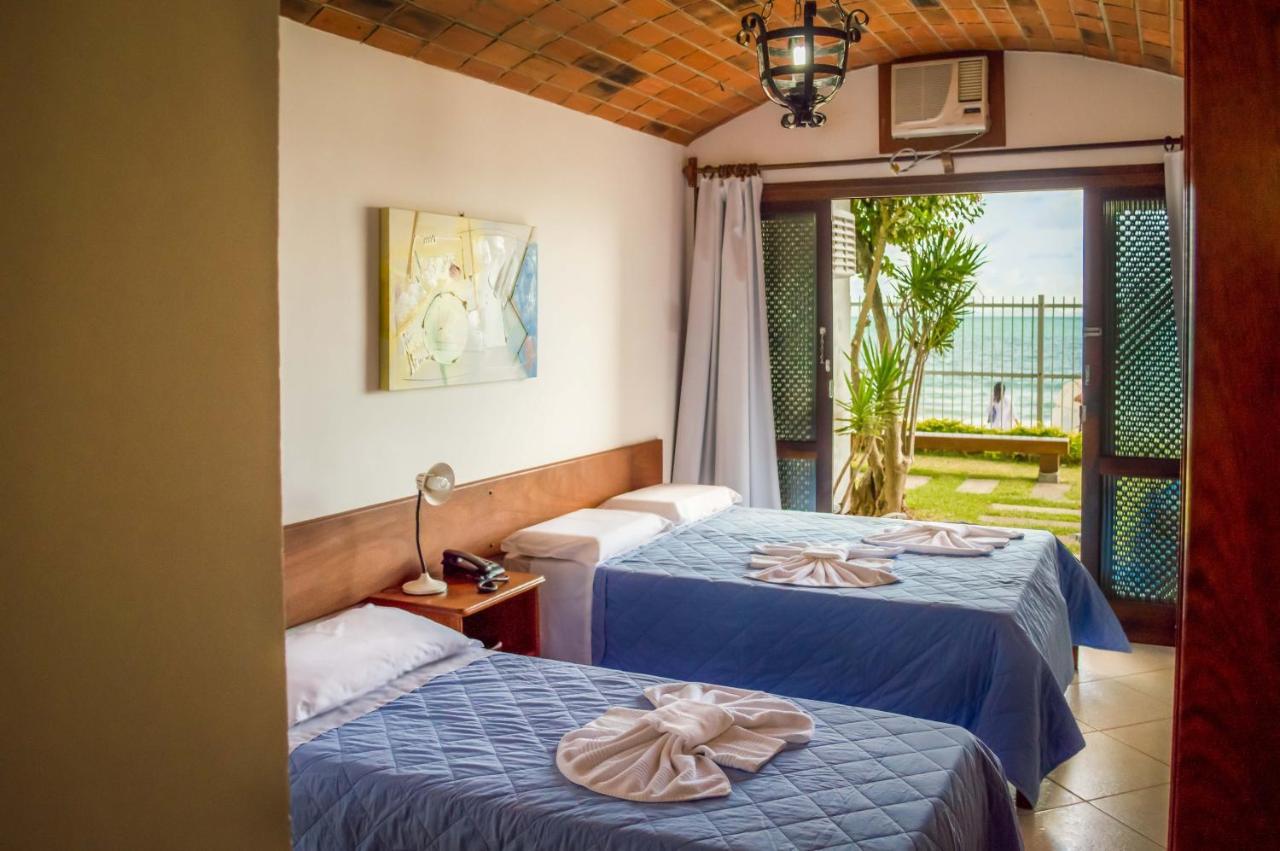 Quarto Triplo com Vista do Mar